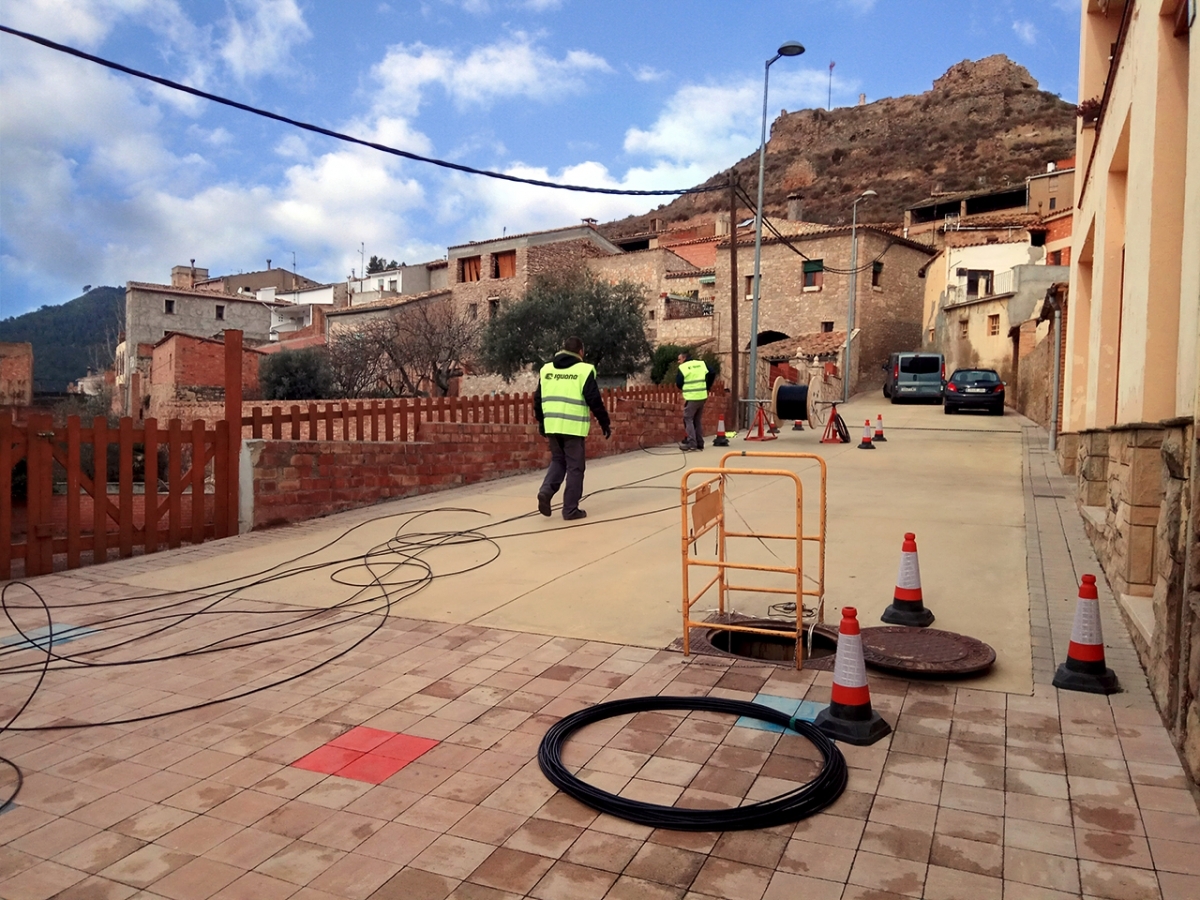 Els tècnics d'Iguana, al carrer del Roser