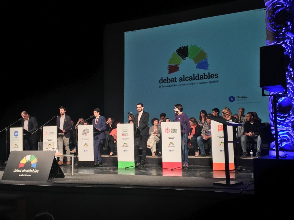 Els sis candidats, a l'inici del debat